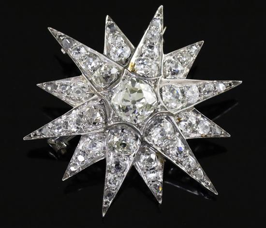 A Belle Epoque diamond starburst brooch, the graduated old-cut diamonds in platinum setting, 37mm.